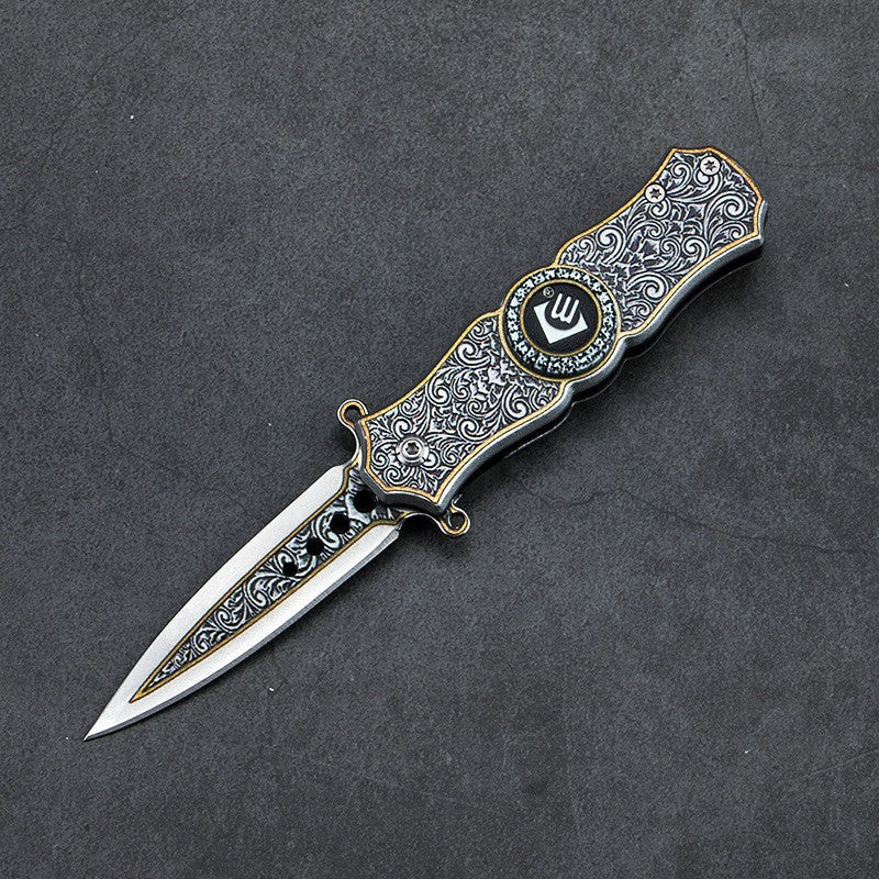 Finger-spinner-kniv